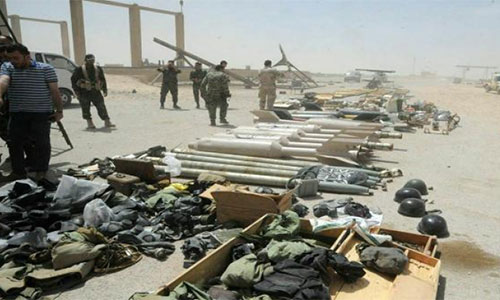 Blindado británico entre las armas entregadas por los terroristas en Deraa